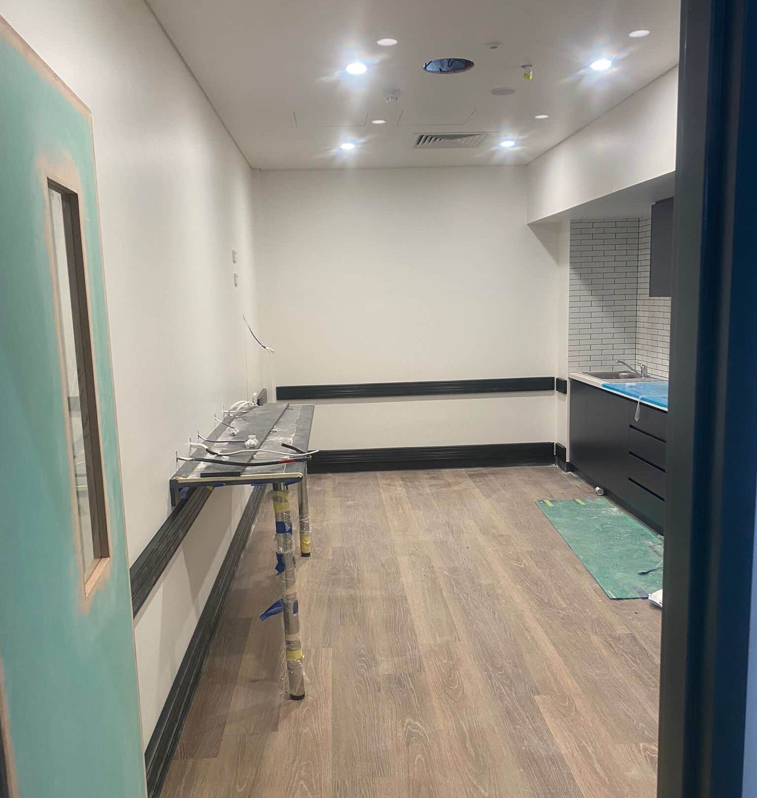 Black bump rails installed along the walls.