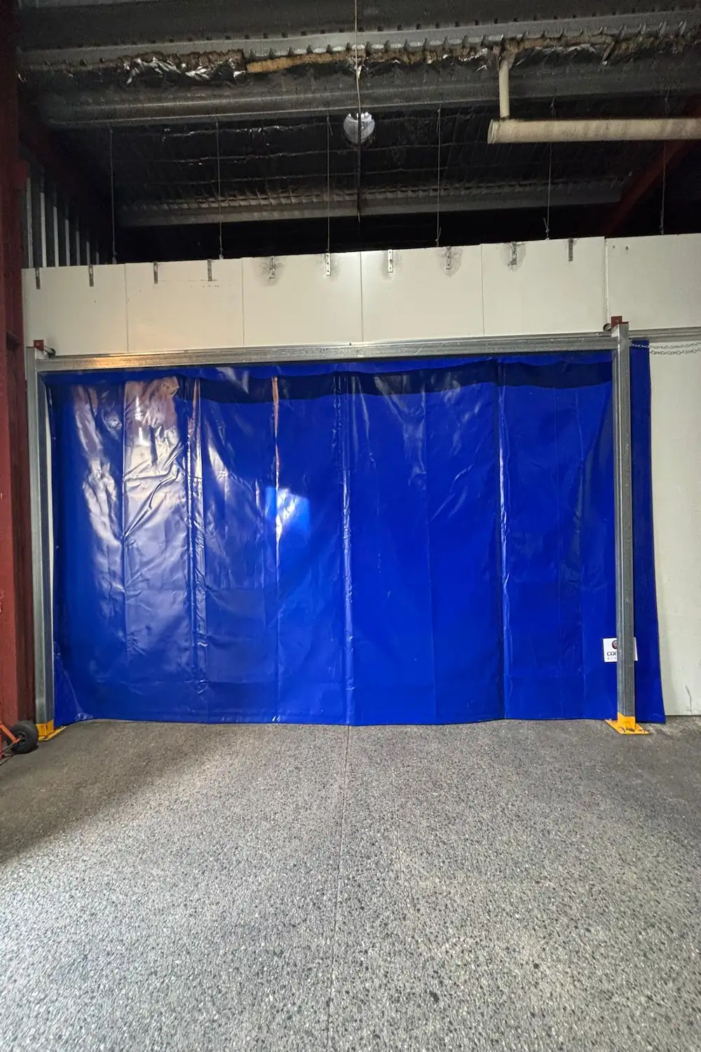 Blue vinyl industrial curtain